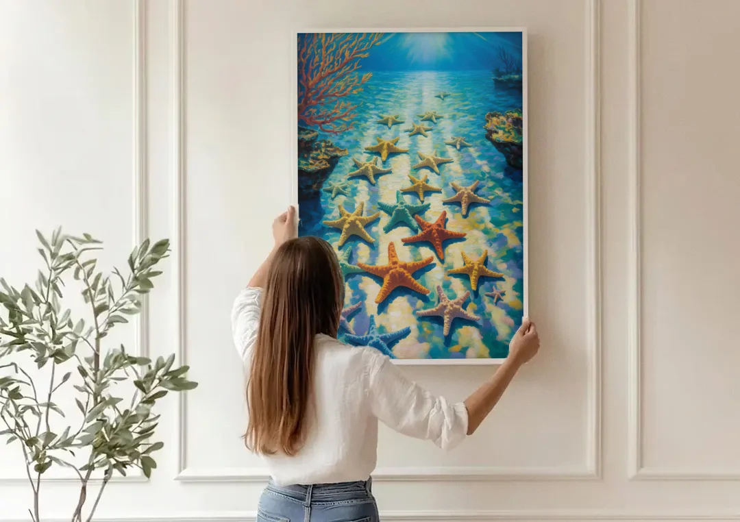 El Cielo Starfish Shallows canvas wall art being hung on a paneled wall