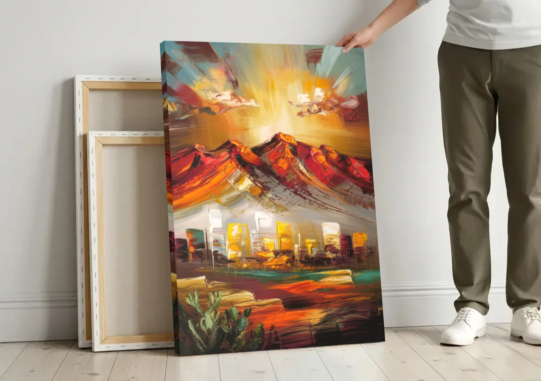 El Paso Mountain Horizon canvas wall art leaning against a wall next to blank canvases