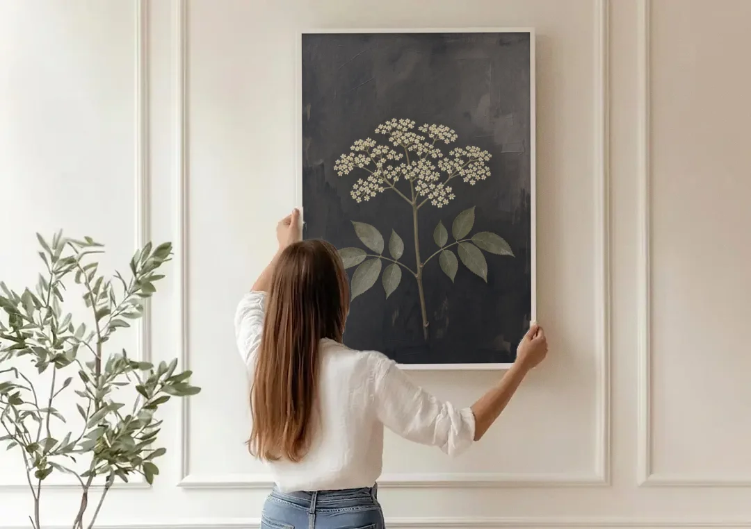 Elderflower Painting on a Dark Field canvas wall art being hung on a paneled wall