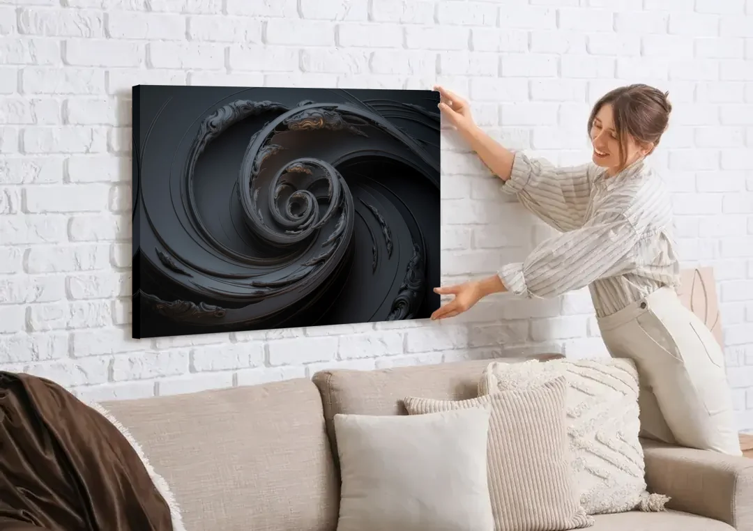 Elegance in Motion Black Abstract canvas wall art being hung on a white brick wall above a sofa