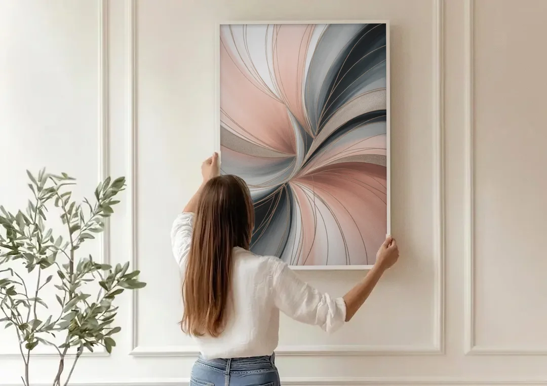 Elegant Curves Pink and Grey Abstract canvas wall art being hung on a paneled wall