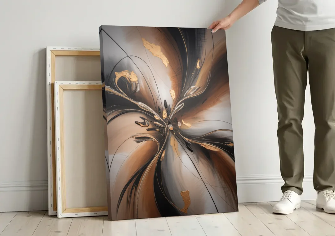 Elegant Fluidity in Brown Abstract canvas wall art leaning against a wall next to blank canvases