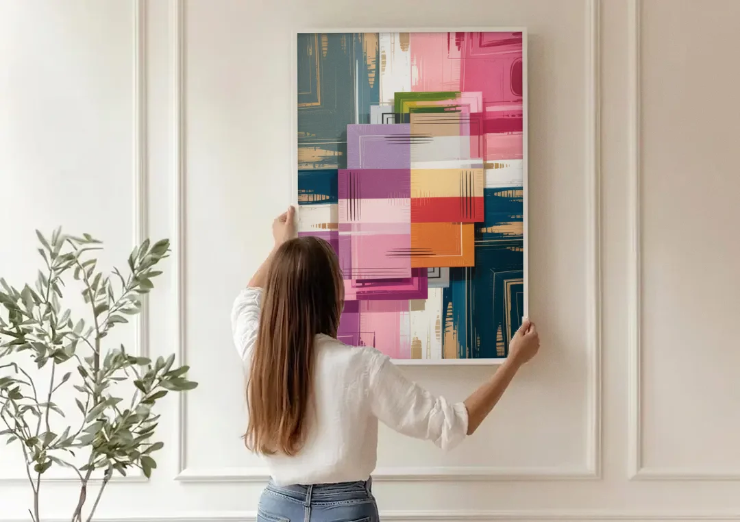 Elegant Geometry in Pink Abstract canvas wall art being hung on a paneled wall