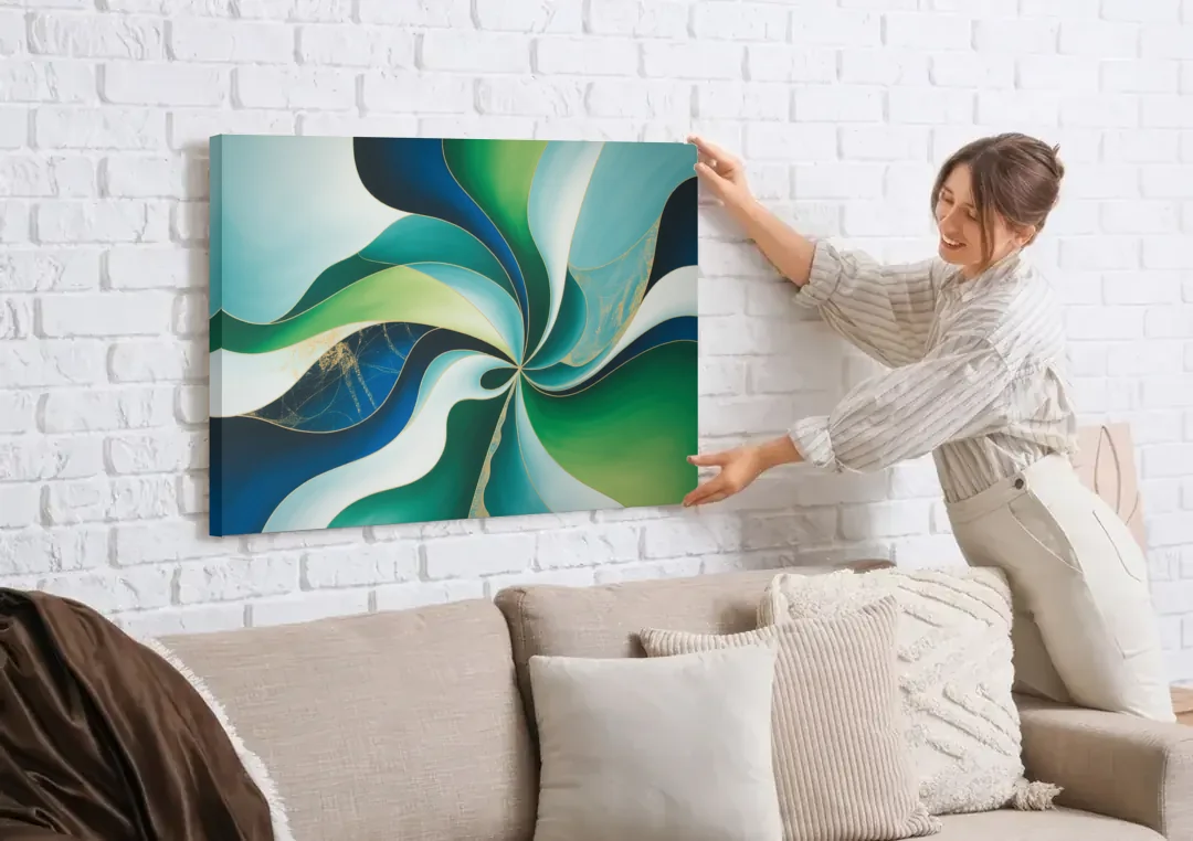 Elegant Harmony Blue and Green Abstract canvas wall art being hung on a white brick wall above a sofa