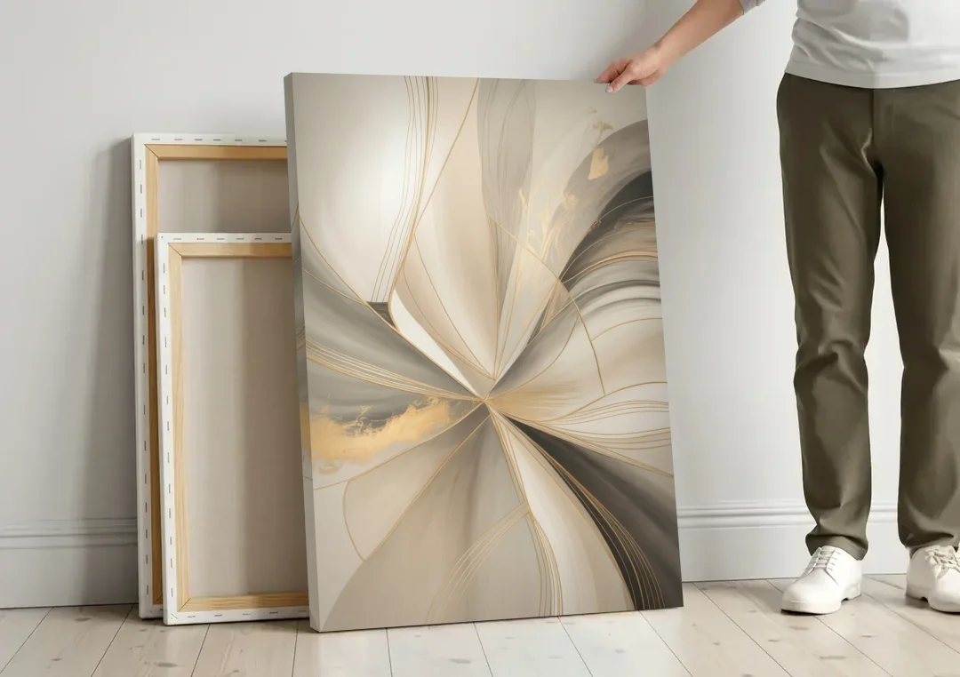 Elegant Interplay Beige Abstract canvas wall art leaning against a wall next to blank canvases