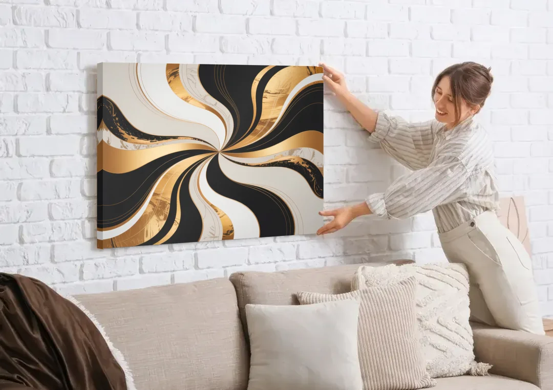Elegant Interplay Black White and Gold Abstract canvas wall art being hung on a white brick wall above a sofa