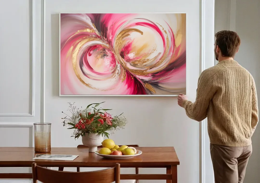 Elegant Swirl Pink and Gold Abstract canvas wall art above a dining table