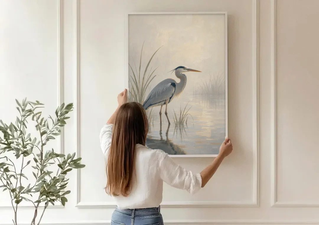 Elegant Wall Art of a Grey Heron at Dawn canvas wall art being hung on a paneled wall