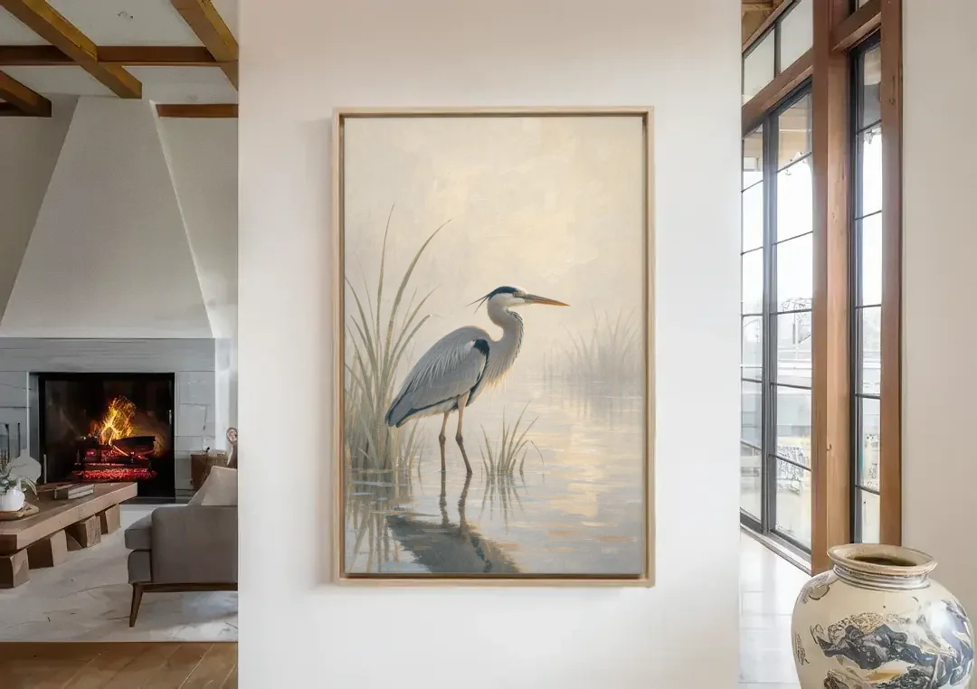 Elegant Wall Art of a Grey Heron at Dawn canvas wall art in a living room with a fireplace