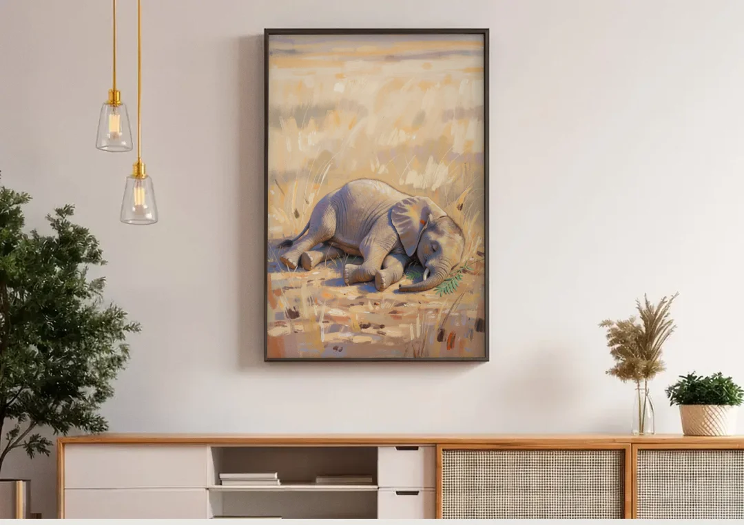 Elephant Calf Asleep on Its Side canvas wall art above a wooden sideboard under pendant lights