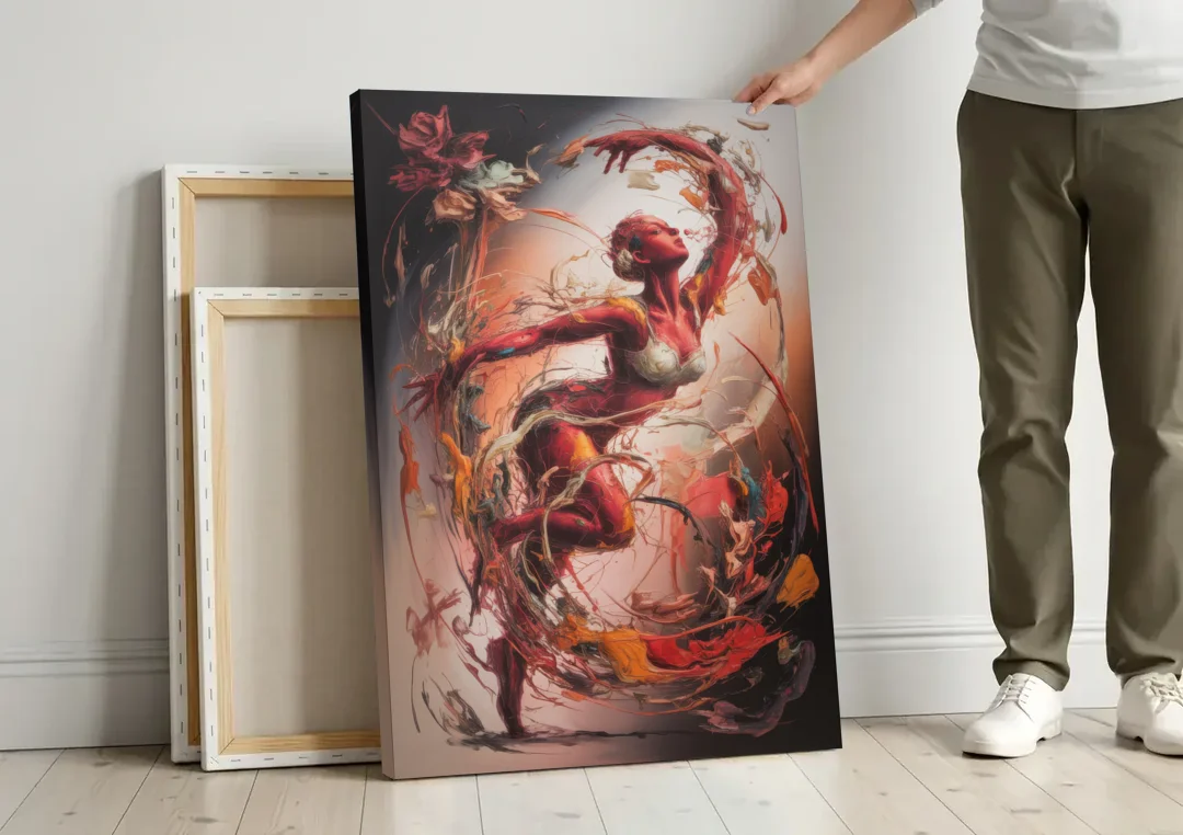 Energetic Harmony Red Abstract canvas wall art leaning against a wall next to blank canvases