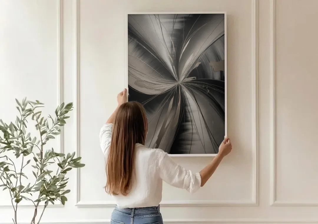 Entwined Elegance Black and Grey Abstract canvas wall art being hung on a paneled wall