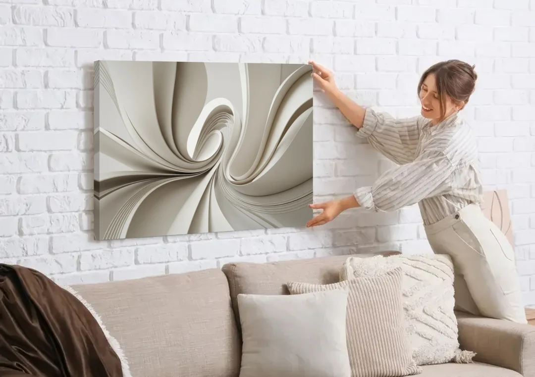 Ethereal Elegance White Abstract canvas wall art being hung on a white brick wall above a sofa