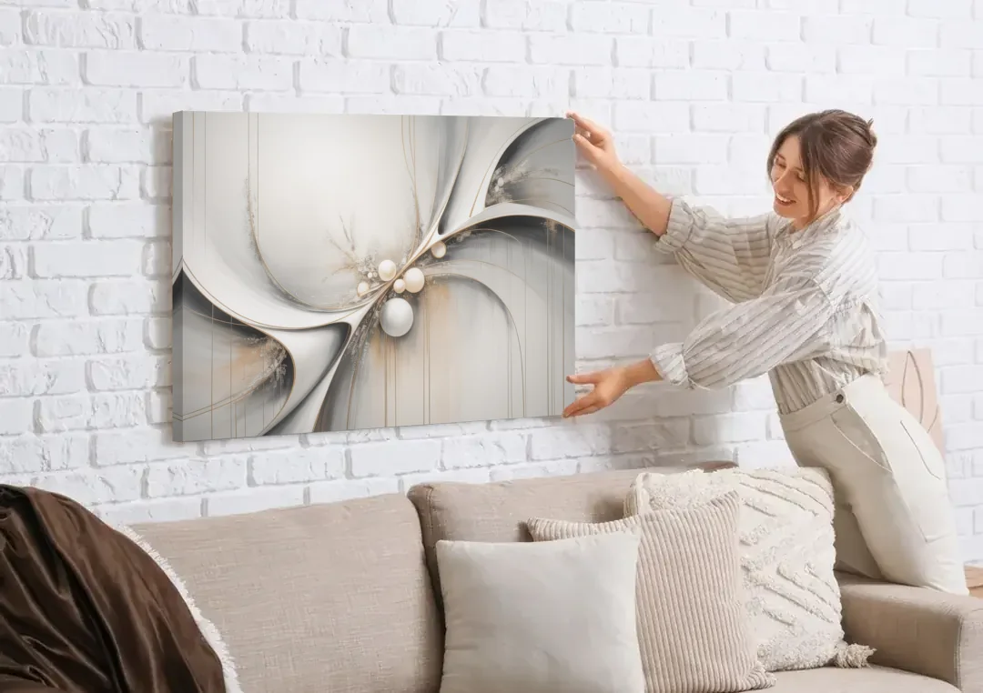 Ethereal Serenity White Abstract canvas wall art being hung on a white brick wall above a sofa
