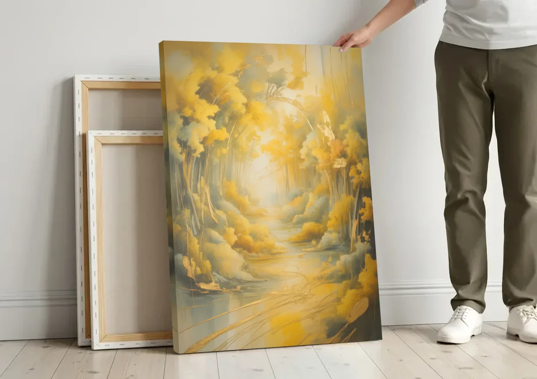 Ethereal Sunlight Yellow Abstract canvas wall art leaning against a wall next to blank canvases