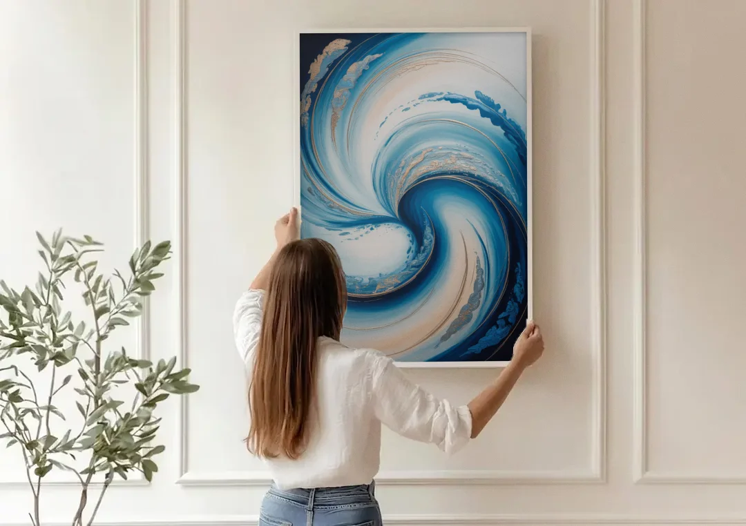 Ethereal Swirls in Blue Abstract canvas wall art being hung on a paneled wall