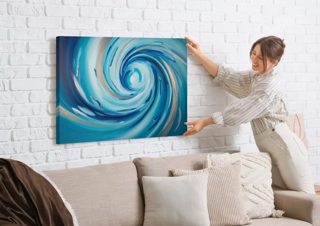 Ethereal Vortex Oceanic Blue Abstract canvas wall art being hung on a white brick wall above a sofa