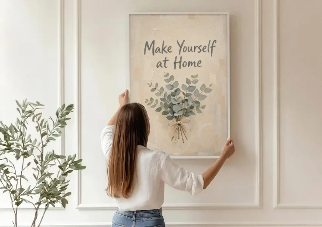 Eucalyptus Canvas Art Make Yourself at Home canvas wall art being hung on a paneled wall