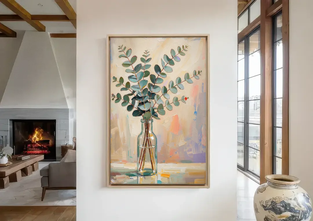 Eucalyptus Canvas Print in a Glass Bottle canvas wall art in a living room with a fireplace