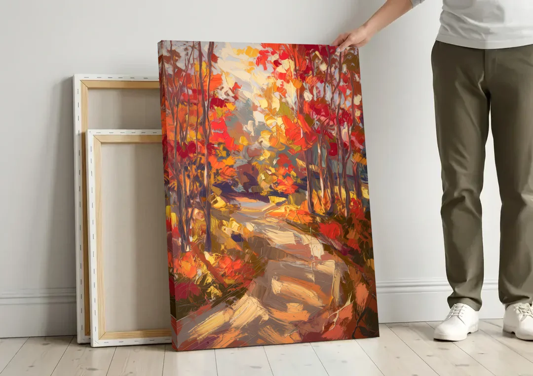 Eugene Autumn Scene canvas wall art leaning against a wall next to blank canvases