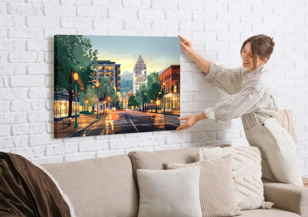 Eugene Cityscape Downtown canvas wall art being hung on a white brick wall above a sofa
