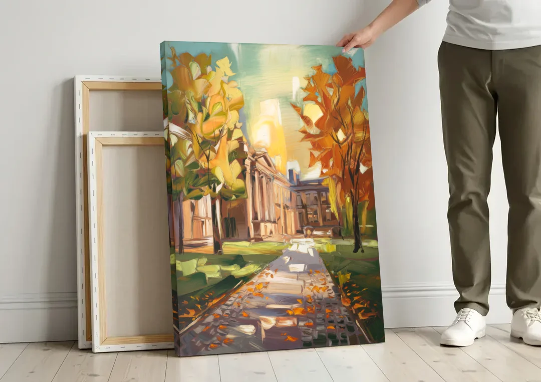 Eugene University Vibes canvas wall art leaning against a wall next to blank canvases