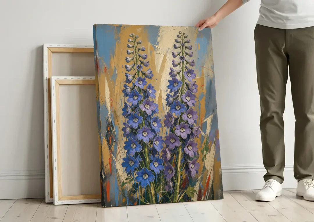 Expressive Flower Painting of Delphinium Spires canvas wall art leaning against a wall next to blank canvases