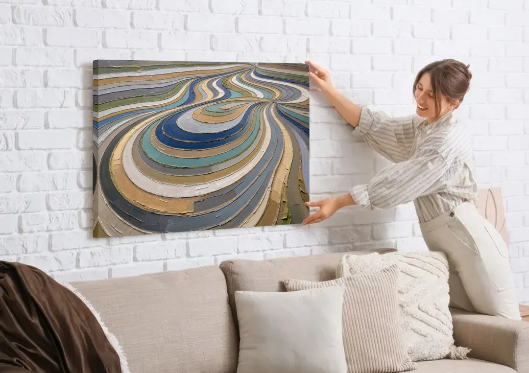 Extra Large Abstract Wall Art of Curving Hillside Terraces canvas wall art being hung on a white brick wall above a sofa