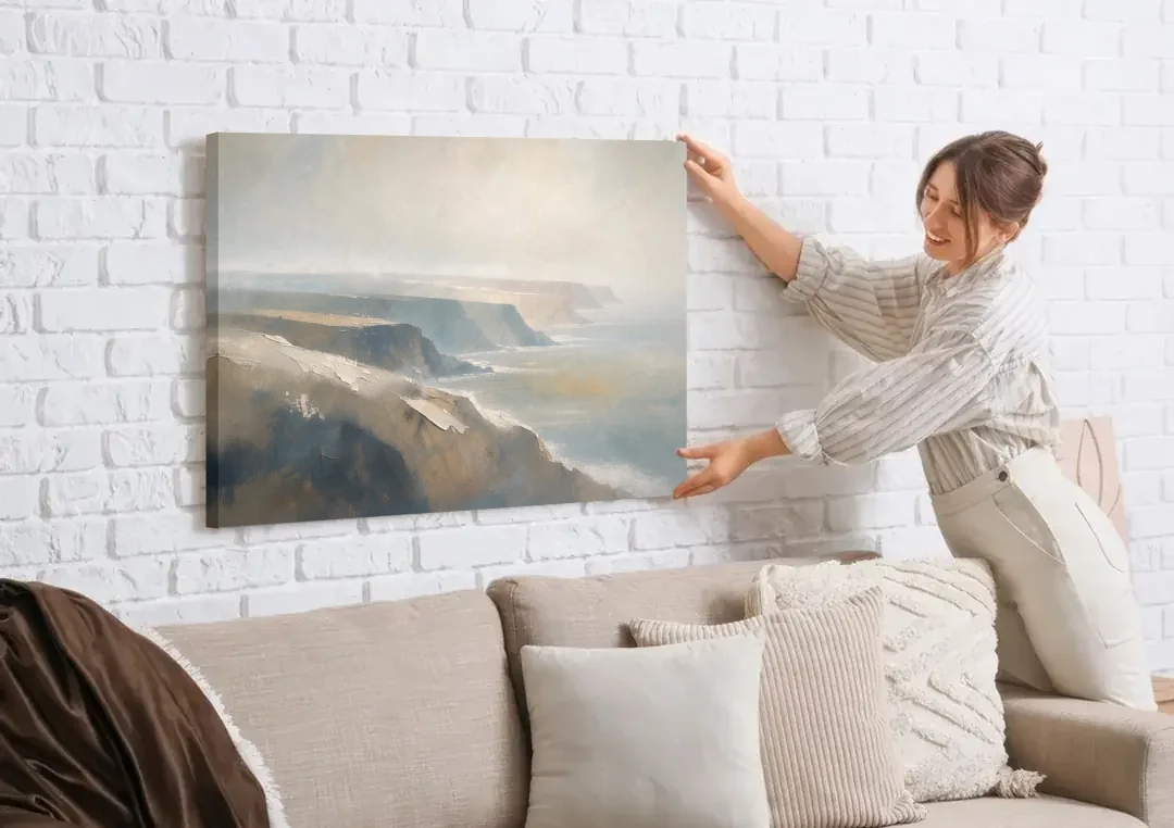Extra Large Canvas Wall Art of Misty Headlands canvas wall art being hung on a white brick wall above a sofa
