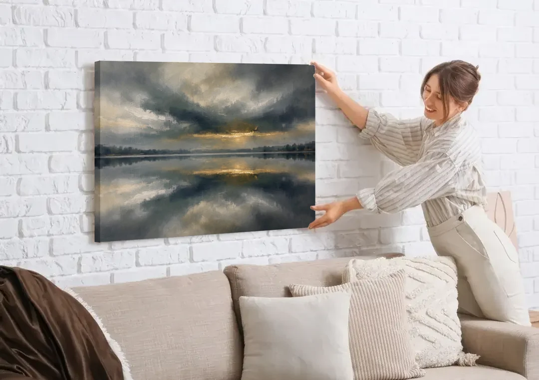 Extra Large Wall Art of a Gilded Stormy Lake canvas wall art being hung on a white brick wall above a sofa