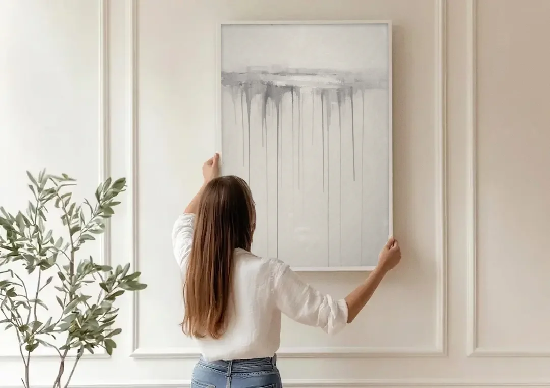 Falling Grey Rain Lines for the Dining Room canvas wall art being hung on a paneled wall