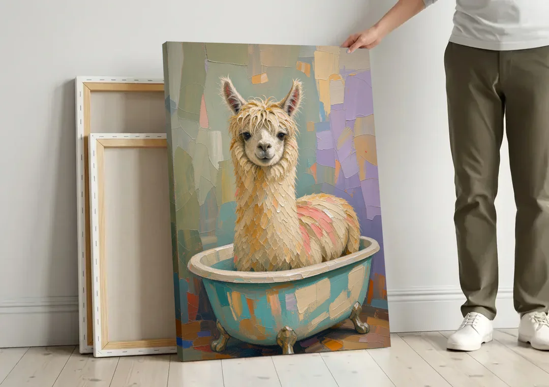 Farm Animal Bathroom Decor with a Soggy Alpaca canvas wall art leaning against a wall next to blank canvases