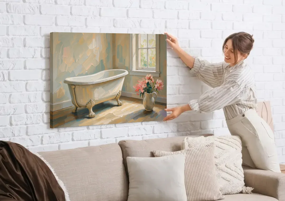 Farmhouse Bathroom Decor with a Clawfoot Tub and Peonies canvas wall art being hung on a white brick wall above a sofa