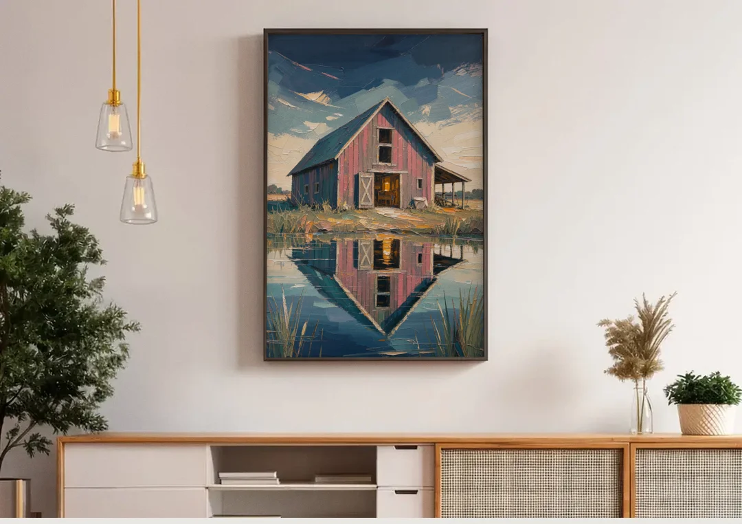 Farmhouse Red Barn Reflected in the Farm Pond canvas wall art above a wooden sideboard under pendant lights