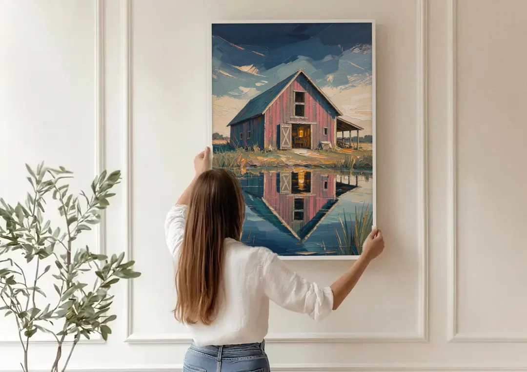 Farmhouse Red Barn Reflected in the Farm Pond canvas wall art being hung on a paneled wall