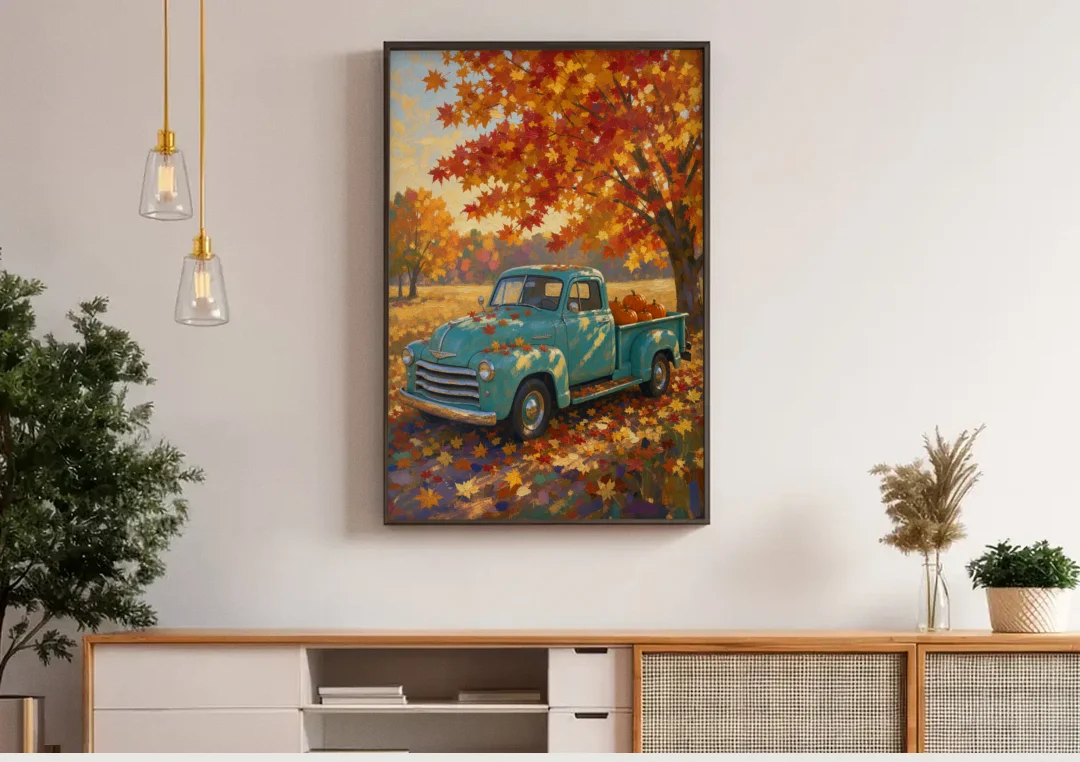 Farmhouse Truck Wall Art with Pumpkins Under Maple canvas wall art above a wooden sideboard under pendant lights