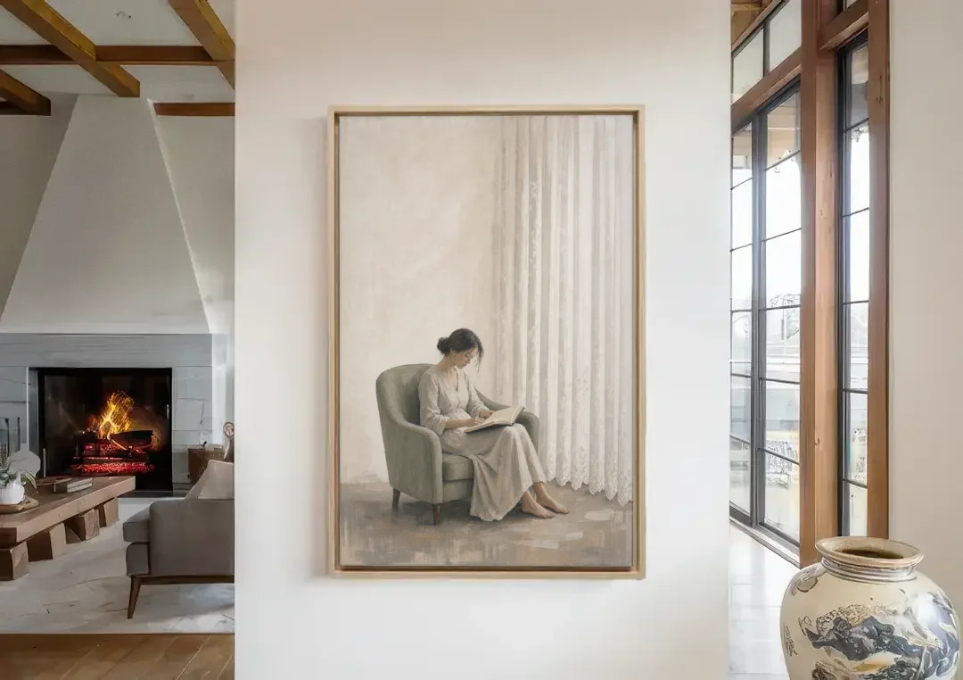 Feminine Wall Art Reader in the Sage Armchair canvas wall art in a living room with a fireplace