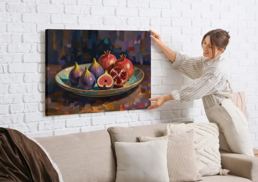 Figs and Pomegranates for the Dining Room canvas wall art being hung on a white brick wall above a sofa