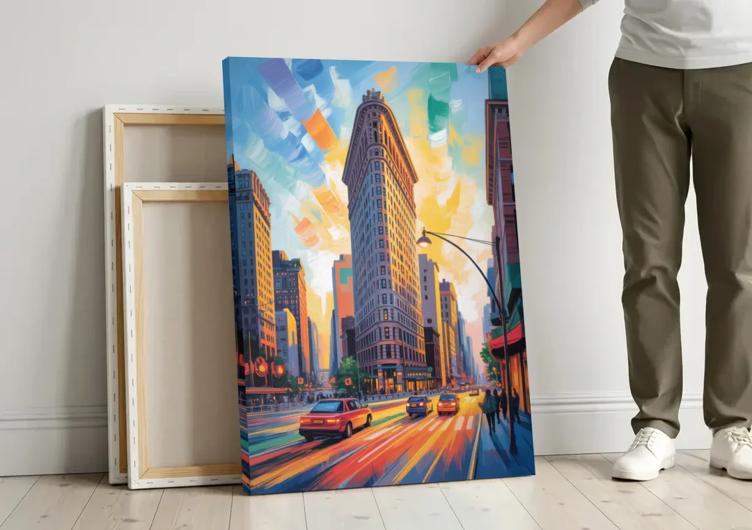 Flatiron Building Landmark canvas wall art leaning against a wall next to blank canvases