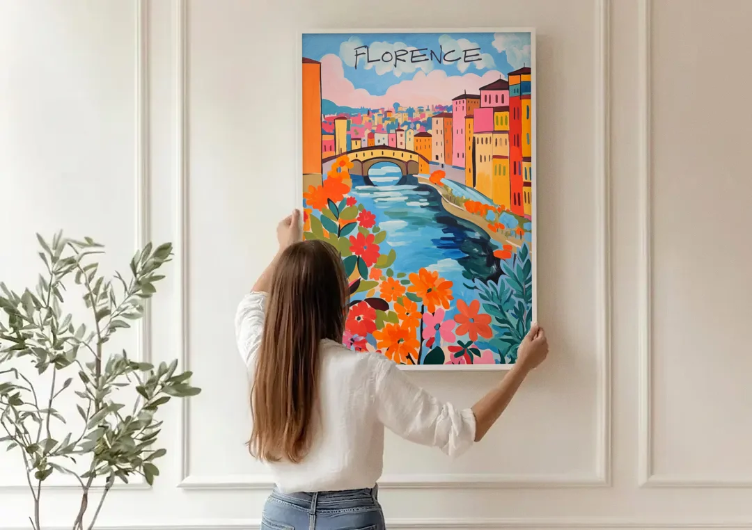 Florence Painting of the Arno in Bloom canvas wall art being hung on a paneled wall