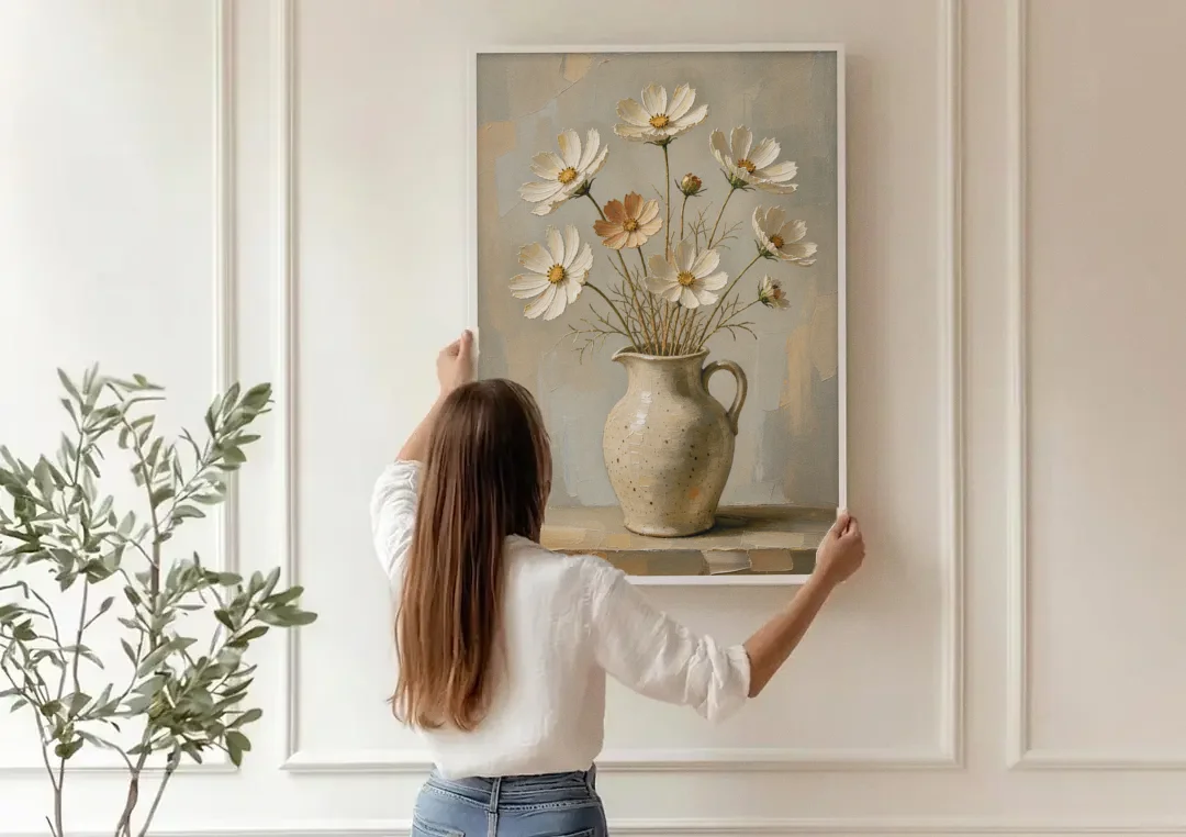 Flowers in Vase Painting with Cosmos and Speckled Jug canvas wall art being hung on a paneled wall