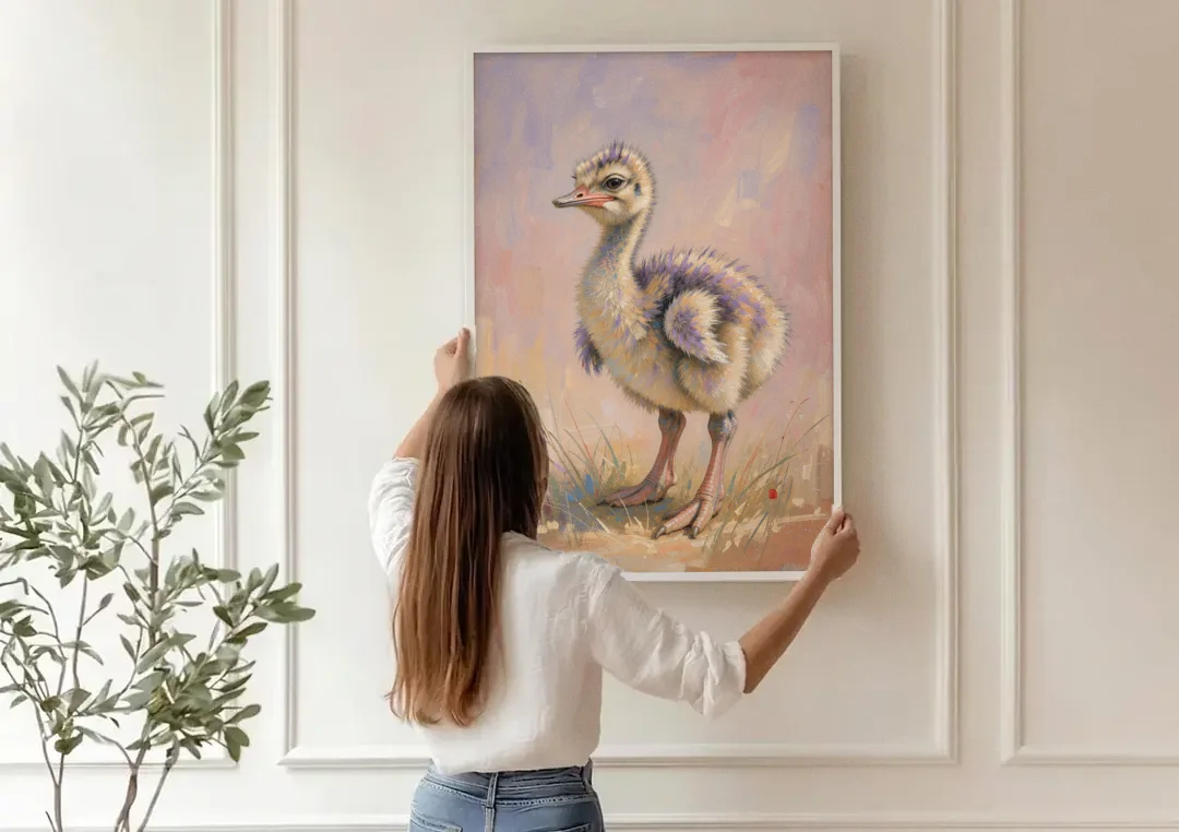 Fluffy Ostrich Chick on Long Pink Legs canvas wall art being hung on a paneled wall
