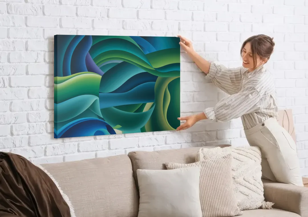 Fluid Harmony Blue and Green Abstract canvas wall art being hung on a white brick wall above a sofa