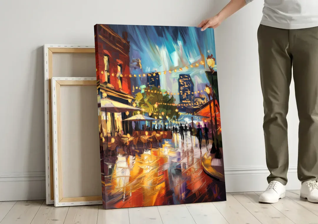 Fort Worth Sundance Square Lights canvas wall art leaning against a wall next to blank canvases