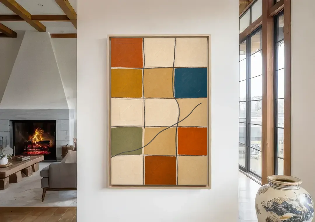 Framed Geometric Wall Art with a Wandering Line canvas wall art in a living room with a fireplace
