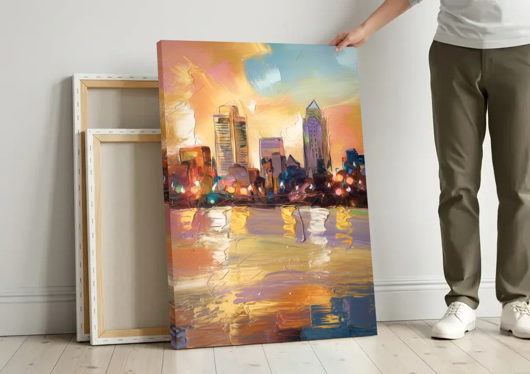 Franklin Skyline View canvas wall art leaning against a wall next to blank canvases