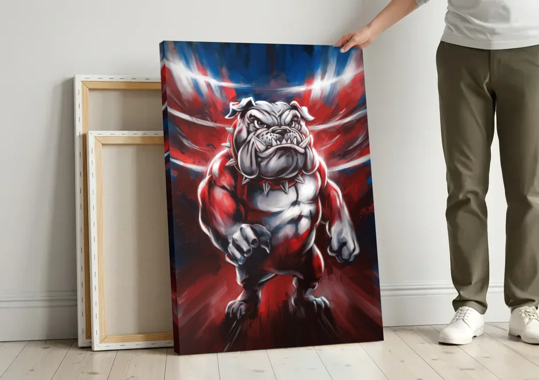Fresno Bulldogs Legacy canvas wall art leaning against a wall next to blank canvases