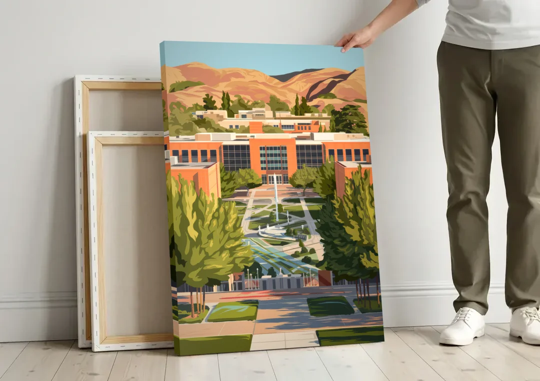 Fresno State Campus Vibes canvas wall art leaning against a wall next to blank canvases
