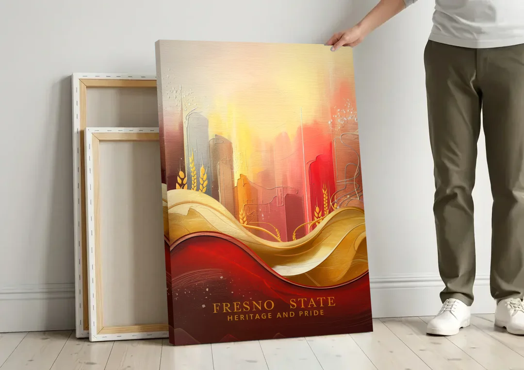 Fresno State Heritage and Pride canvas wall art leaning against a wall next to blank canvases
