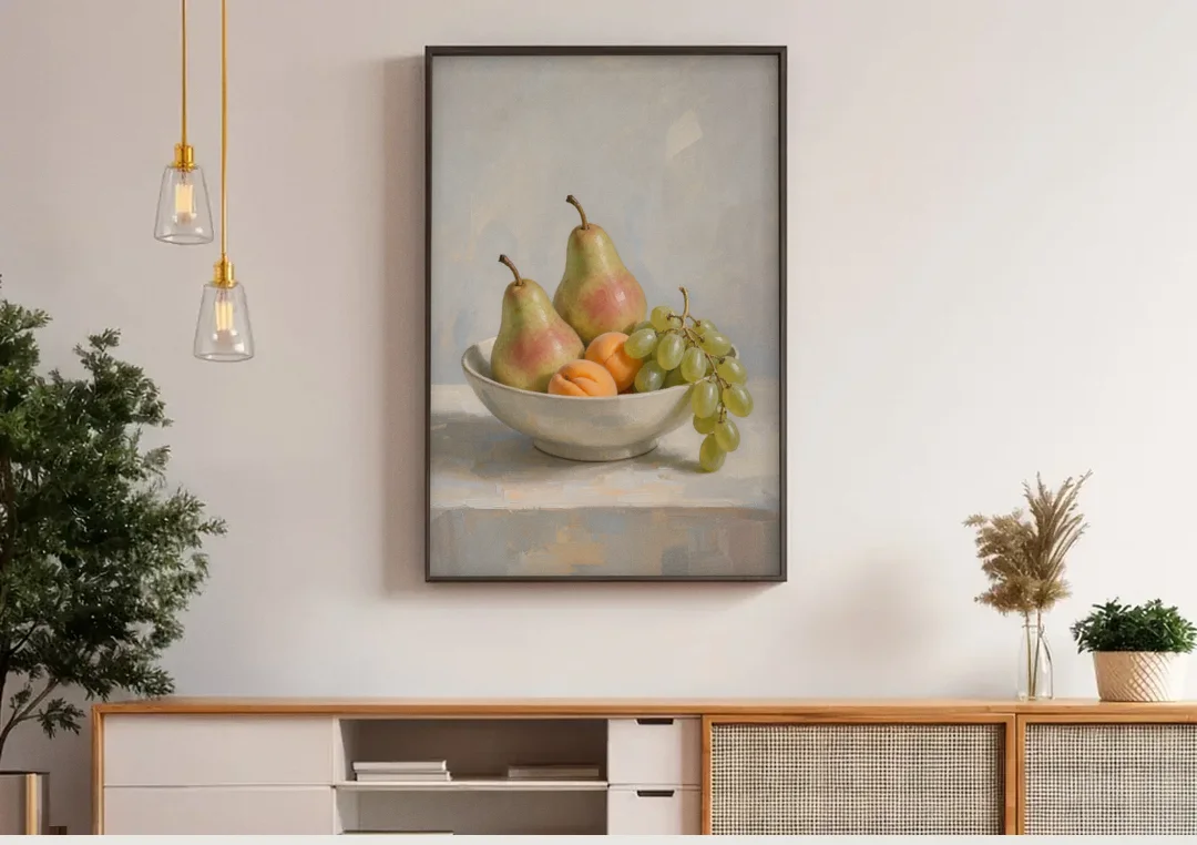Fruit Bowl Still Life Painting With Pears and Grapes canvas wall art above a wooden sideboard under pendant lights